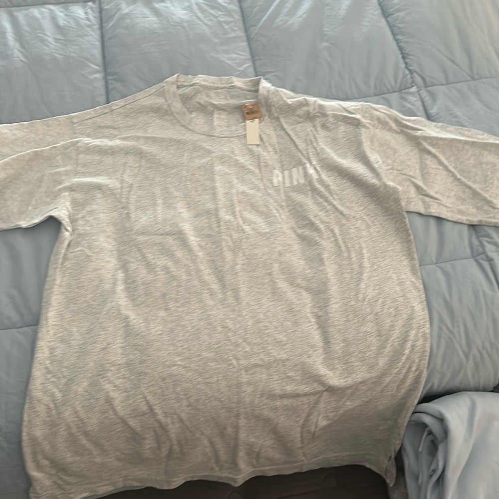 Brand new Victoria Pink women’s long sleeve shirt with tags
